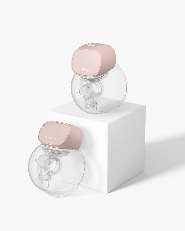 S9 Pro Wearable Breast Pump in soft pink on white pedestal, highlighting design and functionality.