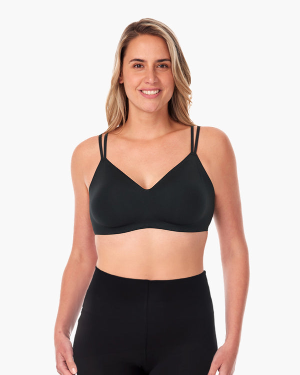 Woman wearing Momcozy black 3-in-1 FlexiStyle Convertible Everyday Bra, showcasing its comfortable double straps and seamless design.