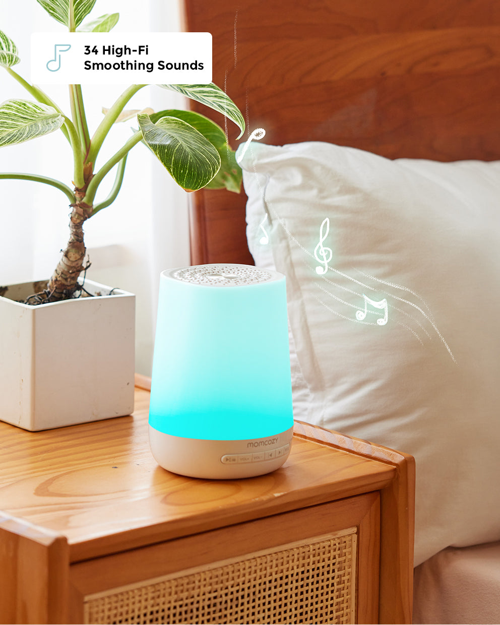 Momcozy Smart Baby Sound Machine with teal night light and 34 soothing sounds, designed for baby sleep and app control.