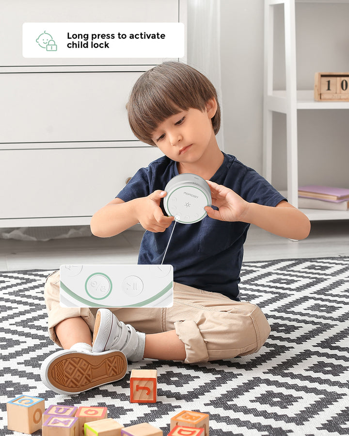 Child using Momcozy Portable Baby Sound Machine with child lock feature on display.