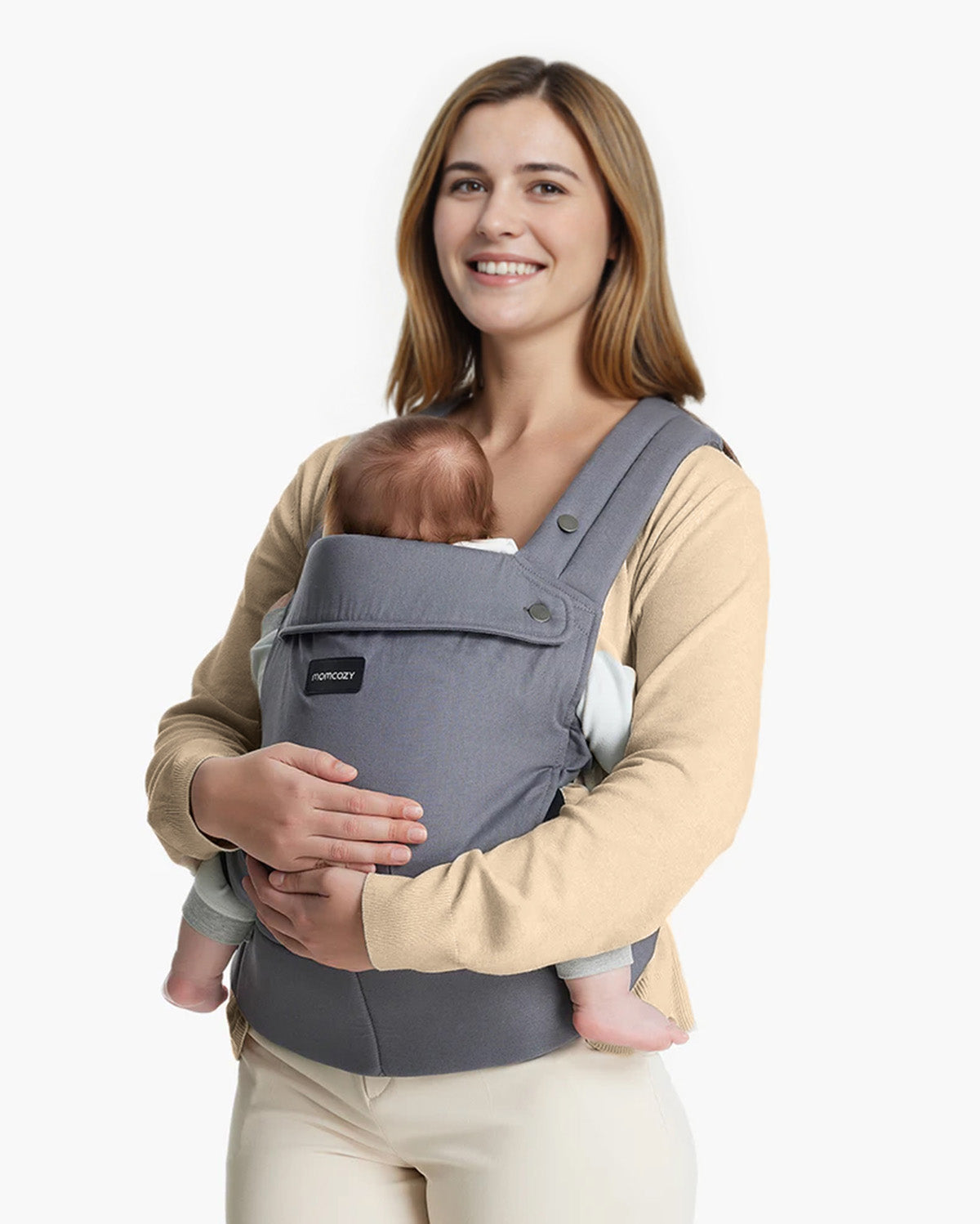 Momcozy PureHug baby carrier in grey, holding a baby. Offers comfort & support, with adjustable straps for convenient babywearing.