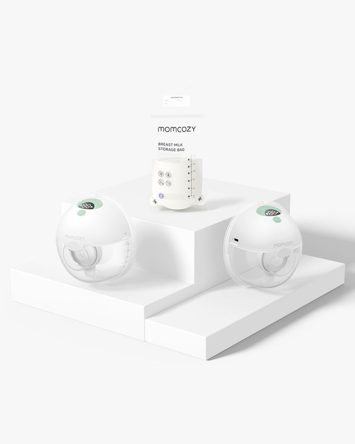 Momcozy M5 Wearable Breast Pump and milk storage bag on a pedestal, highlighting sleek design.