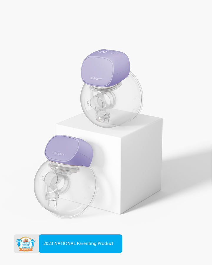 The lilac S9 Pro Wearable Breast Pumps, displayed on a pedestal, boast the 2023 National Parenting Product Award badge.